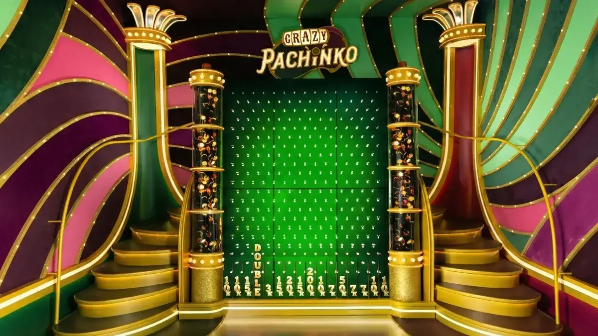 Crazy Time Pachinko bonus screen with puck and multiplier pegs